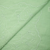 Broderie anglaise festonnée vert d'eau