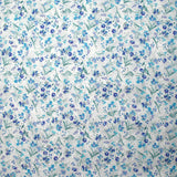 Broderie anglaise imprimée petites fleurs bleu fond blanc