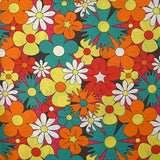 Coton imprimé floraison disco rouge, orange et turquoise