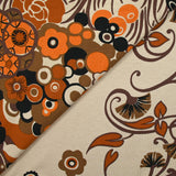Jersey de viscose imprimé champ de fleurs orange et marron fond beige