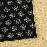 Jersey de viscose imprimé médaillon de fleurs grises fond noir