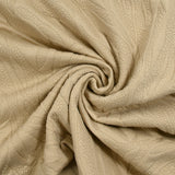 Jersey matelassé fissures fond beige