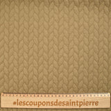 Matelassé jersey braids Camel background