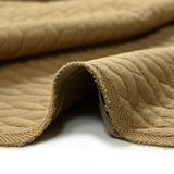 Matelassé jersey braids Camel background
