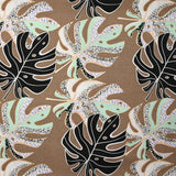 Lin viscose imprimé pluie de monsteras fond marron