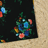 Maille de viscose satinée bouquet de fleurs fond noir