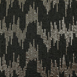 Maille fine polyester effet sequin en chevron doré fond noir
