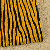 Maille velours et lurex tigre noir fond jaune orangé
