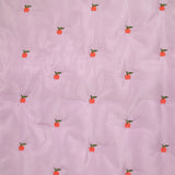Matelassé pommes brodées fond mauve