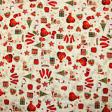 Cotton poplin printed with reindeer, snowmen and gifts on an ecru background