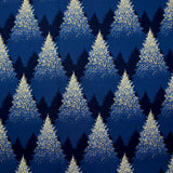 Popeline de coton imprimée sapins scintillants fond bleu nuit