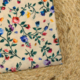 Satin polyester imprimé herbier fond beige clair
