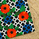 Sergé de coton et viscose coquelicot et mosaïque fond blanc