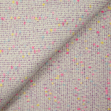 Tweed de laine mélangée confettis rose et bleu fond violet
