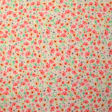 Viscose imprimée spirale de fleurs roses et orange fond écru