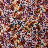 Viscose imprimée vibration d'Orient orange et magenta fond blanc
