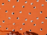 Viscose lisiado esfericidad impresa de fondo naranja