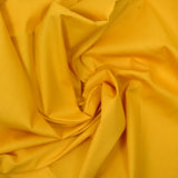 Coton uni jaune bouton d'or
