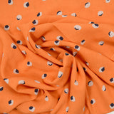 Viscose lisiado esfericidad impresa de fondo naranja