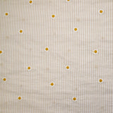 Coton tissé teint brodé marguerite fond rayé blanc et beige