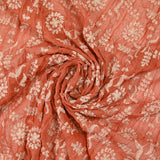 Voile de polyester froissé et brodé fantaisie fond orange