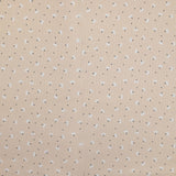 Piqué de coton imprimé pissenlit fond beige