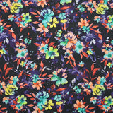 Coton imprimé fleuri graphique orange et violet fond noir