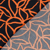 Ottoman viscose crêpe spaghetti orange print black background
