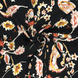 Viscose crepe printed paisley black background