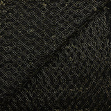 Puntilla de poliéster calada con entrelazado de lurex dorado, fondo negro