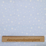 Piqué de coton imprimé étoiles fond bleu clair