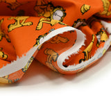 Popeline de coton imprimé Garfield fond orange