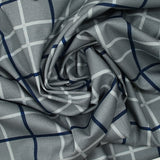 Coton imprimé à carreaux marine fond gris