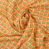 Viscose imprimée la pointe écrue fond orange