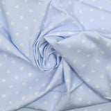 Piqué de coton imprimé cœur fond bleu clair