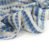 Voile polycoton imprimé ossement bleu et beige fond blanc