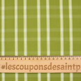 Dyed woven polycotton contrasting ecru white line olive green background