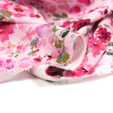 Viscose imprimée fleurs rose fond rose