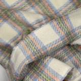 Brushed wool blend in ecru, blue, gray, orange and green checks