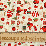 Cotton poplin printed with reindeer, snowmen and gifts on an ecru background
