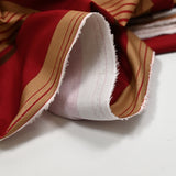 Algodón rojo oscuro y estampado marrón claro