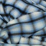 Lainage polyester brossé à carreaux bleu myosotis et noir