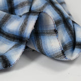 Lainage polyester brossé à carreaux bleu myosotis et noir