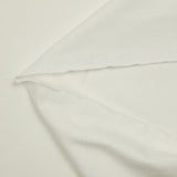 Jersey de coton fin flammé blanc cassé