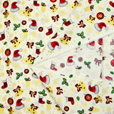 Cotton poplin printed with Santa's hats, socks and holly on an ecru background
