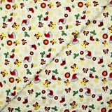Cotton poplin printed with Santa's hats, socks and holly on an ecru background