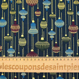 Cotton poplin printed with vintage Christmas baubles on a midnight blue background