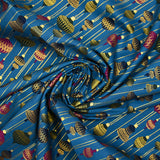 Cotton poplin printed with vintage Christmas baubles on a duck background
