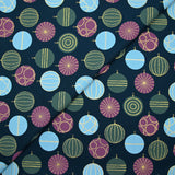 Cotton poplin printed with festive balls and golden sparkles on a navy blue background