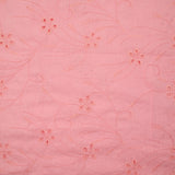 Broderie anglaise festonnée rose dragée
